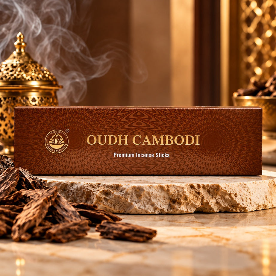 Oudh Cambodi Premium Incense Sticks in luxury brown and gold packaging with oud wood and a warm fragrance-inspired background.